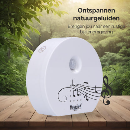 Melodiez Musikbox Weiß – Naturklänge mit Bewegungssensor – Kompakte Soundbox für beruhigende Vogelstimmen, Meeresrauschen & Dschungelklänge – Inklusive Batterien – Elegantes Design 
